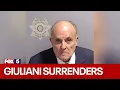 Giuliani turns himself in at Georgia jail