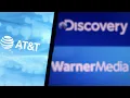 AT T Warner Brothers Discovery stocks pop on mega-merger