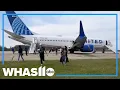 United Airlines passengers de-plane due to unknown device