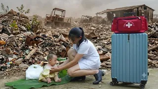 Full A female nurse helps a 5-month-old baby girl abandoned by her parents by the roadside
