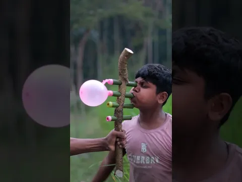 Creative Tree Branch Craft with Four Colorful Balloons
