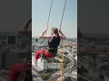 Download Lagu Soar over Berlin's rooftops on a swing almost 400 feet high | REUTERS