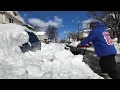 NJ residents dig out cars after facing 30 inches of snow