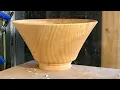 Richard Raffan finds a bowl in a split claret ash blank.