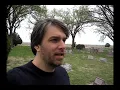 Lacy visits the graves of the Clutter family