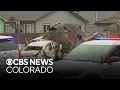 Denver police investigate crash that sent car into home