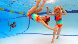 Rainbow Twin Swimming  Rainbow Twin Swimming