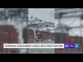 Shocking shows shipping containers crash into port waters