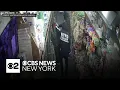 shows suspects in NYPD raid gear robbing Brooklyn bodega