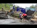 Download Lagu Loading Black Sand Into a Mitsubishi Truck