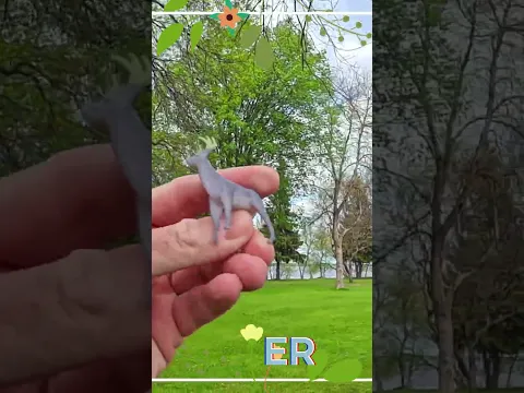 Finding Toy Deer By Dandelions On Grass