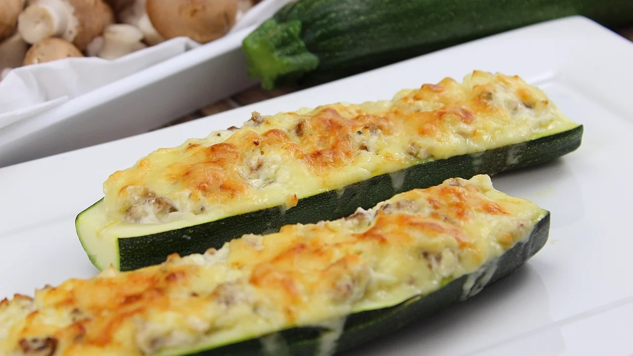 Learn to cook these delicious vegetarian stuffed zucchini boats. We add chopped mushrooms, red bell . 