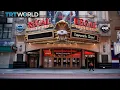New York s movie theatres reopen at 33 audience capacity Money Talks