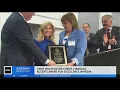 Cheryl Fiandaca accepts award for excellence in media