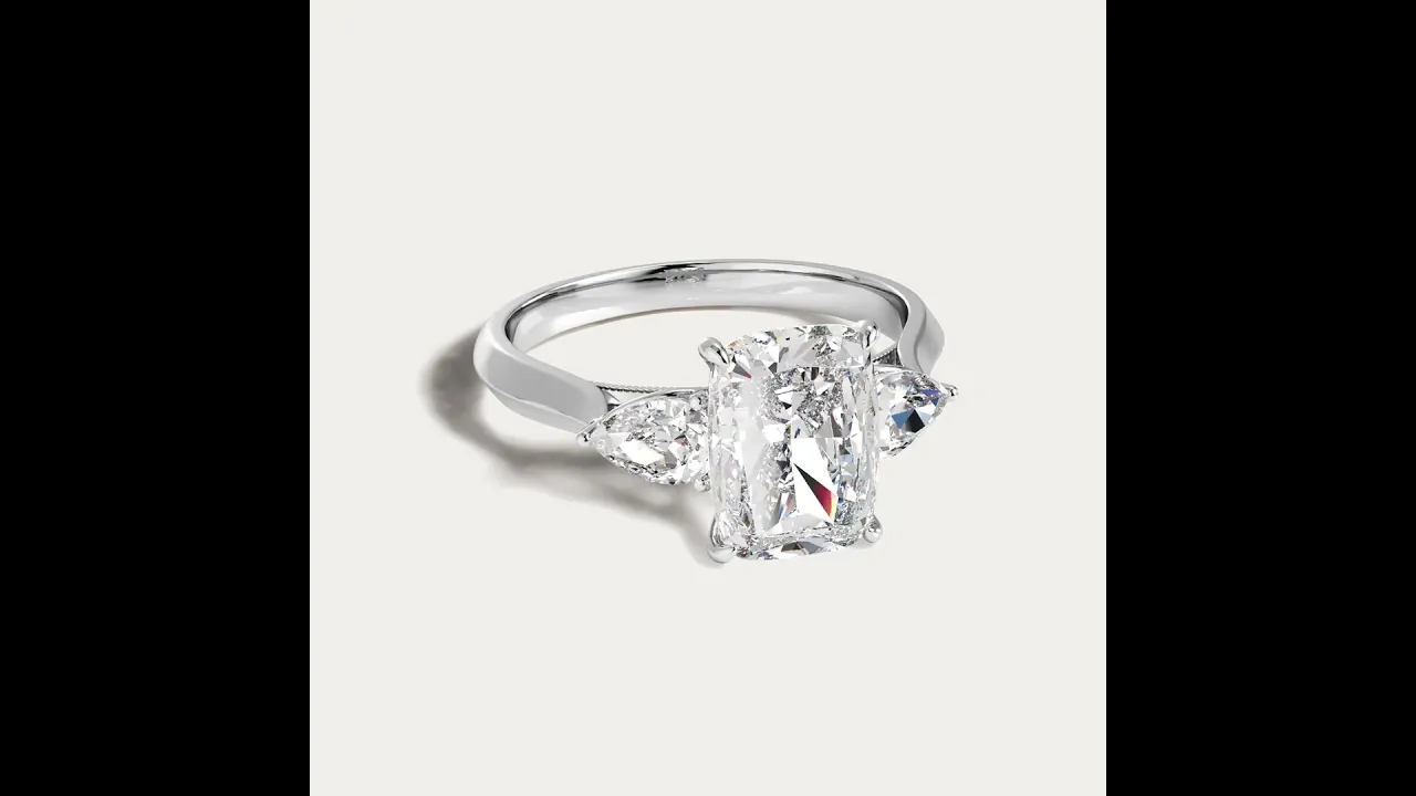 Natalie丨Elongated Cushion Lab Diamond Engagement Ring with Leaf-Inspired Pear Accents