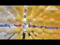 Queuers at Uptown Apple Store as viewed through psychedelic bubbles on display