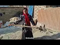 Starting a new life: a homeless family prepares their shack for the winter chill!