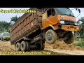 Seperti atraksi saat dump truk jemping tinggi