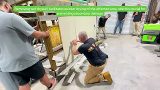 SERVPRO Technicians Demonstrate Drywall Removal in a Water Damage Restoration Scenario