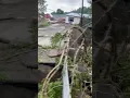 House road over bridge collapses following flash flooding in Vermont