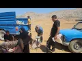 Daily life Saleh washes clothes sells scraps and repairs the hut