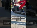 Getting set up for tree removal Non-marking rubber tracks in action