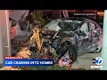 Out-of-control Tesla crashes into multiple homes in Orange County
