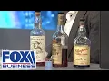 CEO shows off 2K bottles in jaw-dropping liquor stash