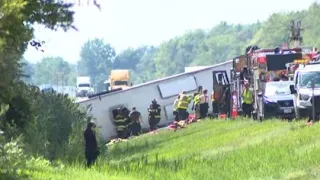 WATCH Tour bus rolls over after crash on upstate New York highway in mass casualties accident