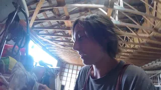 Scraping the Deck of a Traditionally Built Sailboat