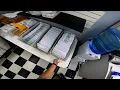 POV working in USPS shipping center lots of packing 4k