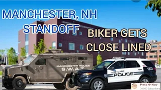 SWAT TEAM STANDOFF BYSTANDER GETS CLOTHS LINED BY POLICE TAPE MANCHESTER NH