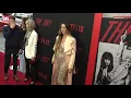 Courtney Sixx flaunts her baby bump at The Dirt premiere