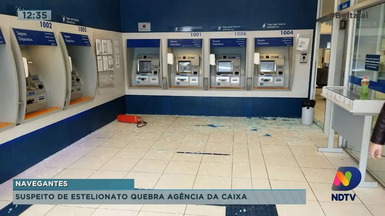Suspeito de estelionato quebra agência da Caixa, em Penha caixa eletrônico é furtado