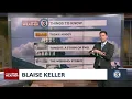 Meteorologist Blaise Keller gives Thursday s forecast with the help of a friend