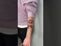 Stroke survivor ribbon with floral tattoo