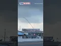 A Large Waterspout Spins On The Coast Of Key West Florida Following A Day Of Stormy Weather