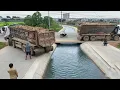 OMG Nice Process operator filling delete the ditch using dump truck pour soil stone by bulldozer