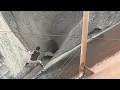 Unloading 3 600 tons of phosphate rock from a barge