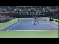 Isner Follows a Ferocious Kick Serve to Net