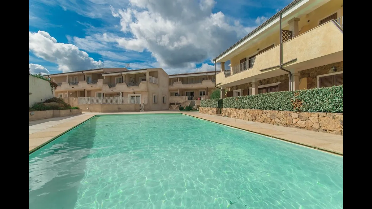 Sardegna NE, Palau - apartment for sale. Private garden, pool, walking distance from the beach.