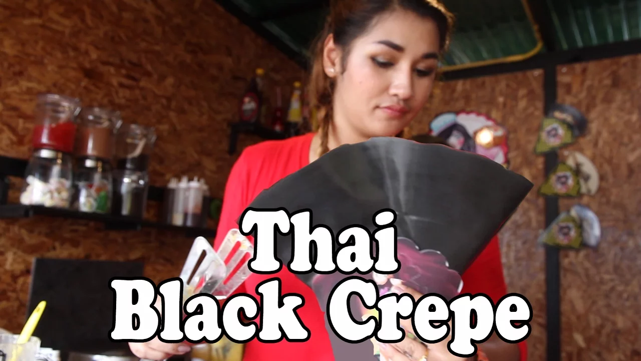 Thai Street Food: Black Crepe in Thailand. Delicious Charcoal Crepe. Thai Dessert.