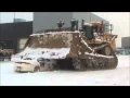 Caterpillar D11 crushes car for United Way