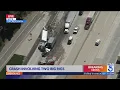 Crash involving 2 big rigs sends boxes spilling onto 210 Freeway