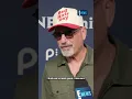 Howie Mandel gives his friendship with Simon Cowell a golden buzzer