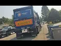 Republic Services 2569 Oshkosh quiet electric McNeilus side loader on trash