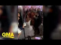 Watch these newlyweds surprise their guests with a creative entrance l GMA