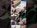 He handed the bag of banana meat to the cashier to make it heavy