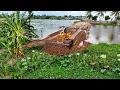 Download Lagu Complete💯% VDO a bulldozer is pushing sand to make a dam to prevent flooding during the rainy season
