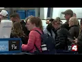 Long lines at St Louis Lambert International Airport during suspension of TSA PreCheck